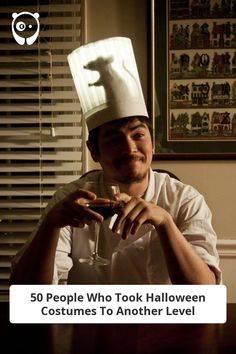 a man wearing a chef's hat and holding a wine glass in his hand