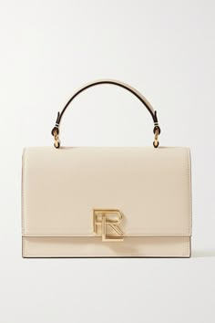 Utterly timeless and effortlessly elegant, Ralph Lauren Collection's 'The RL' tote is a soon-to-be classic. Crafted from cream leather with a suede lining, it has hand-painted edges and gleaming gold hardware. The structured profile will stand up to regular use, but store it in the dust bag between outings. Spring Purses, Luxury Bags Collection, Beauty Finds, Ralph Lauren Bags, Elegant Bags, Fancy Bags, Classic Bags, Ralph Lauren Collection, Pretty Bags