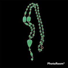 Long And Lovely, This Authentic Art Deco ( 1920-1930’s) Flapper Necklace Features Mottled Green Czech Glass, Often Erroneously Referred To As Peking Glass. The Necklace Features Round And Oval Beads With Flat Disks And A Long 3 1/4” Drop Anchored With A Large Triangular Bead. The Links And Bead Caps Are Brass. The Necklace Measures 31 1/2” With A Brass Spring Ring Clasp. Vintage Green Rectangular Necklace, Luxury Green Art Deco Necklace, Poured Glass Necklace Flapper, Green Teardrop Faceted Beads Jewelry, Hand-strung Green Vintage Beaded Necklaces, Flapper Necklace, Drop Necklace, Art Deco Jewelry, Bead Caps