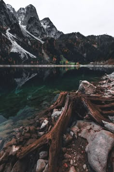 a mountain lake surrounded by rocks and trees