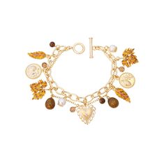 Fall Autumn Harvest Charm Bracelet.  This collectable charm bracelet is a fun addition to any outfit. Each charm is beautifully detailed and crafted; all being finished with a combination of hand applied enamel and hand set Swarovski crystals. All charms are fixed to a gold plated bracelet. Charms comprise; leaves, acorns and Swarovski pearls.     *    Gold plated and enamel Harvest charm bracelet     *    A collectable woman's charm bracelet to enjoy and wear year upon year     *    Dimensions: Gold Fall Jewelry, Fall Charm Bracelet, Halloween Jewlery, Charm Bracelet Gold, Crystal Falls, Boo Basket, Book Jewelry, Bracelet Charms, Gold Charm Bracelet