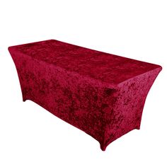 a table covered in a red crushed velvet