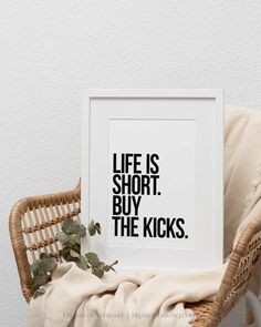 a black and white print with the words life is short buy the kicks