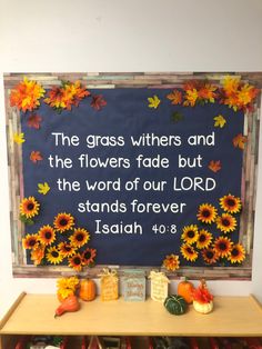 a bulletin board with flowers and the words, the grass witches and the flowers fade but the word of our lord stands forever