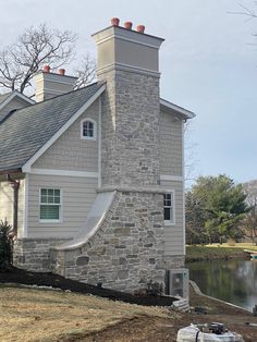 a house that is next to a body of water