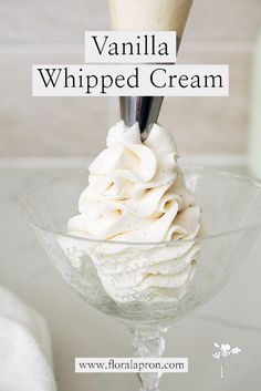 vanilla whipped cream in a glass bowl on a white tablecloth with text overlay