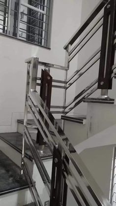 an image of a metal staircase going up the stairs