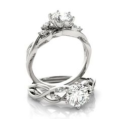 an engagement ring with three stones on it