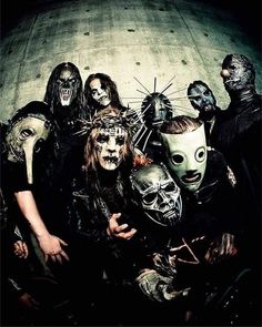 a group of people with masks on their faces