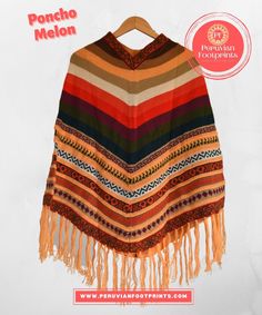 This is a soft poncho that will embrace you keeping you warm. This beautiful alpaca poncho is perfect for the cold winter season.  It displays a casual design with Andean colorful designs and patterns inspired by the cultures of the ancient. Handmade Alpaca Poncho Shawl, Handmade Alpaca Shawl Poncho, Bohemian Alpaca Shawl Cape, Bohemian Alpaca Shawl One Size, Bohemian Alpaca Shawl, Handmade Alpaca Bohemian Poncho, Bohemian Multicolor Alpaca Shawl, Handmade Bohemian Alpaca Poncho, Bohemian Alpaca Cape For Fall