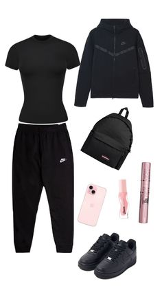 a woman's black outfit and accessories including sneakers, backpack, cell phone, water bottle