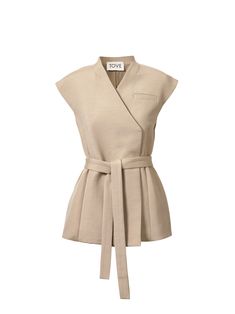 The Bonnie Vest by Tove features a tie-waist silhouette coupled with a sleeveless design for a timeless look. The vest is crafted from a soft cotton blend and is detailed with a plunging, v-neckline and subtle darting for a tailored finish. Pair with the matching pants.[tab] Composition: 73% cotton, 27% viscose; lining: 53% viscose, 47% viscose ECOVERO™ Size and Fit: Runs True to Size Care Instructions: Dry Clean Only Origin: Imported SKU: TOV49P020 Questions about size, fit, or how to style? The KZ team is here to help you look and feel your best! Chat with our stylists via the icon below. Vest Outfits For Women, Soft Vest, Tweed Top, Couple Silhouette, Formal Tops, Essential Dress, Fashion Illustration Sketches, Tailored Blazer, Athleisure Outfits