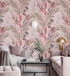 a living room with pink wallpaper and two couches in front of a coffee table