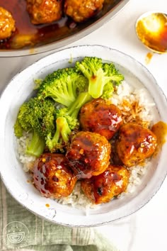 meatballs and broccoli are in a bowl with white rice on the side