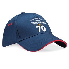 a blue hat with the number 25 printed on it and red stitching around the peak