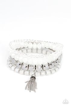 Day Trip Trinket - White Bracelet - Paparazzi Pinched in silver fittings, a stretchy band of dewy white beads joins mismatched strands of cloudy and glassy white crystal-like and stretchy bracelets around the wrist. A single silver chain tassel dances from the crystalline compilation for a final flirty finesse. Sold as one set of four bracelets. Date Of Order: 5/27/2022 Paparazzi Jewelry Images White Sparkling Bracelet, Party White Crystal Bracelet With Rhinestones, White Beaded Metal Crystal Bracelet, White Sparkling Crystal Bracelets, Silver Crystal Bracelet With Hand-set Details, Paparazzi Jewelry Images, White Bracelet, Feeling Pretty, Iridescent Crystal