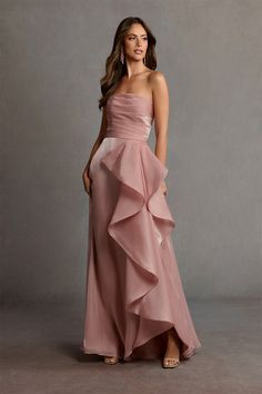 The Enya Handkerchief Gown makes a confident and glamorous statement. This strapless maxi length gown is cut from satin faced chiffon, featuring beautiful handkerchief ruffles cascading down the voluminous skirt. Wear this flirty look to your next formal event. Sister Of The Bride Dresses, Bride Sister Dress, Pink Handkerchief, Atelier Dress, Sleeveless Prom Dress, Prom Dresses Off The Shoulder, Long Gowns, Military Ball Dresses, Formal Wear Dresses