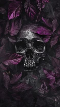 a skull is surrounded by purple leaves