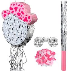 pink and silver party decorations including disco balls, sunglasses and streamers on a white background