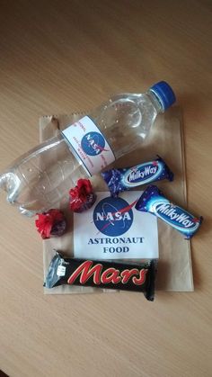 an assortment of mars candy and water bottles