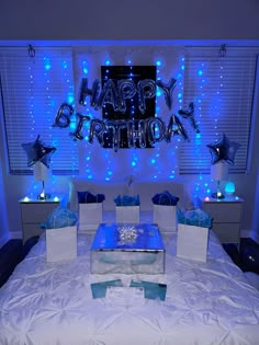 a birthday party with blue and white decorations