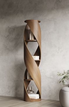 a tall wooden shelf sitting next to a plant