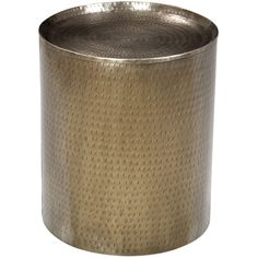 a round metal container with holes on the side and bottom, sitting in front of a white background