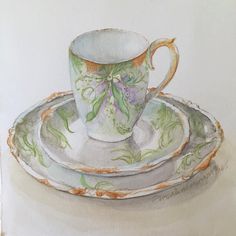 a painting of a tea cup and saucer