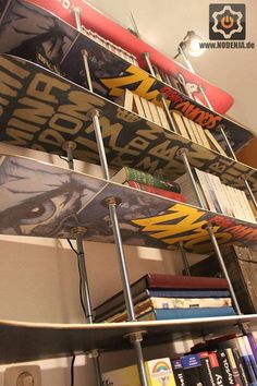 there are many skate boards on the shelves