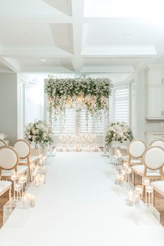 a wedding ceremony setup with candles and flowers