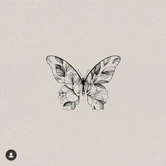 a black and white drawing of a butterfly with flowers on it's back wing