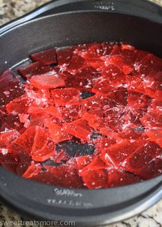 red crushed sugar in a crock pot on the stove top, ready to be cooked