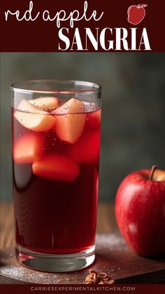 red apple sangria with apples and cinnamon in the background