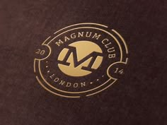 the logo for magnan club london is shown in gold on brown paper with black background