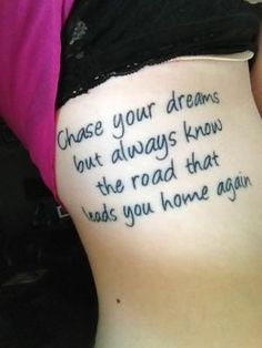 the back of a woman's stomach with a poem written in cursive writing