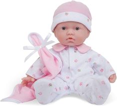 a baby doll with a pink hat and diaper on it's lap sitting down