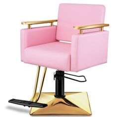 a pink chair with gold trim on it and a black foot rest in front of the chair