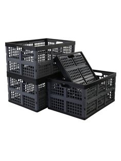 four black plastic crates stacked on top of each other