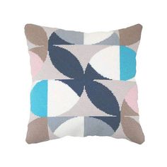 a pillow with an abstract design on it