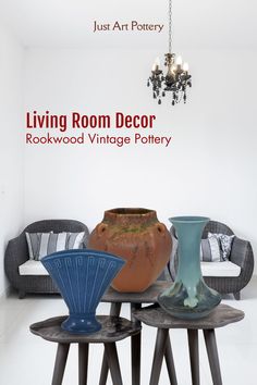 three vases sitting on top of small tables in front of a white wall with the words living room decor rockwood vintage pottery