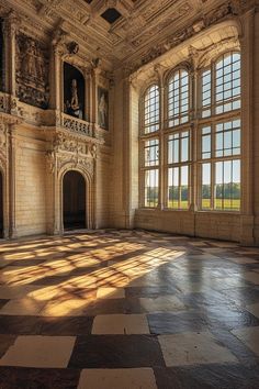 an empty room with large windows and checkered floor