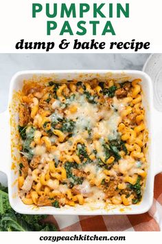 a casserole dish filled with pumpkin pasta and spinach in a white baking dish