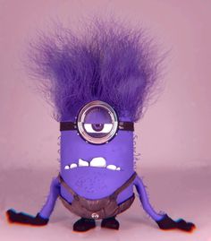 a purple and black minion with some hair on it's head