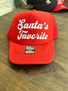 Santa's Favorite Hat Casual Holiday Hat With Curved Brim, Casual Curved Brim Hats For Holiday, Casual Curved Brim Hat For Holidays, Casual Curved Brim Holiday Hat, Adjustable Casual Hats For Holiday, Winter Trucker Hat With Curved Brim, Winter Trucker Hat With Short Brim, Casual Christmas Cap, Casual Christmas Hat, One Size Fits Most