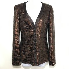 Brown sequins Hidden snap closure Shell - 98% viscose and 2% elastane Lining - 95% polyester and 5% spandex Marked P which is an XS according to the Rachel Zoe size chart Length – 25, Shoulders - 14, Sleeves - 25, Chest - 32,  Hips - 34 inches NEW with $450 tags, Excellent condition! I am happy to answer any questions and provide additional photos. Check out my other items! International buyers are responsible for any import tax or customs duties.  S0323 Fitted Cardigan For Fall Party, Fitted Holiday Cardigan For Party, Fall Fitted Outerwear With Contrast Sequin, Fitted Contrast Sequin Outerwear For Fall, Embellished Formal Top For Fall, Formal Embellished Tops For Fall, Glamorous Fitted Evening Cardigan, Fitted Holiday Cardigan, Formal Sequined Tops For Fall