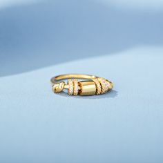 Pretty and classy, this fidget spinner ring spins uber smoothly and is built to satisfy anyone with fidgeting urges. It makes for a perfect gift for a loved one or yourself. Copper Style, Fidget Rings, 18k Gold Jewelry, Spinner Ring, Zircon Ring, Spinner Rings, Personalized Rings, Beaded Rings, Fidget Spinner