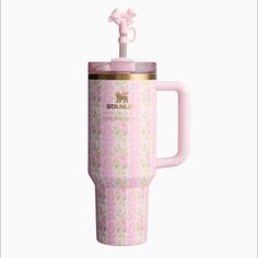 a pink cup with a handle on it