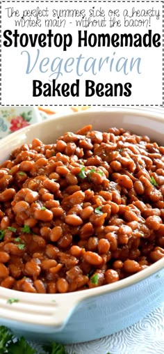 baked beans in a blue dish with parsley on top and the words stovetop homemade vegetarian baked beans