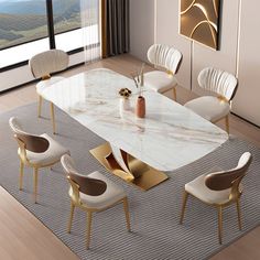 a dining room table with chairs and a rug