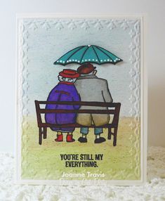 a card with two people sitting on a bench under an umbrella and the words you're still my everything